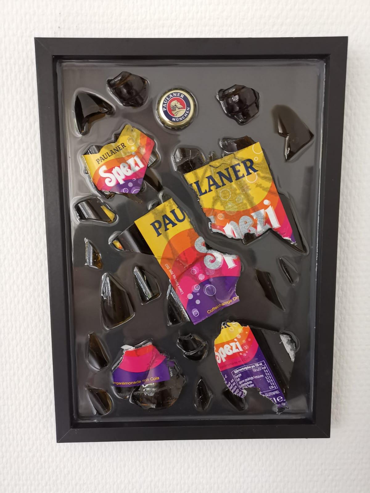 Paulaner Spezi Zerbrochene Flasche
