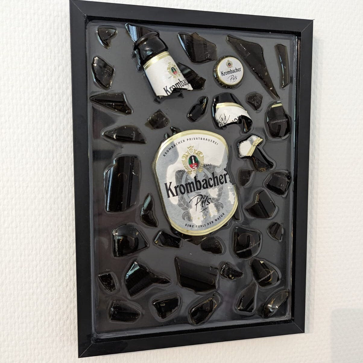 Krombacher Zerbrochene Flasche