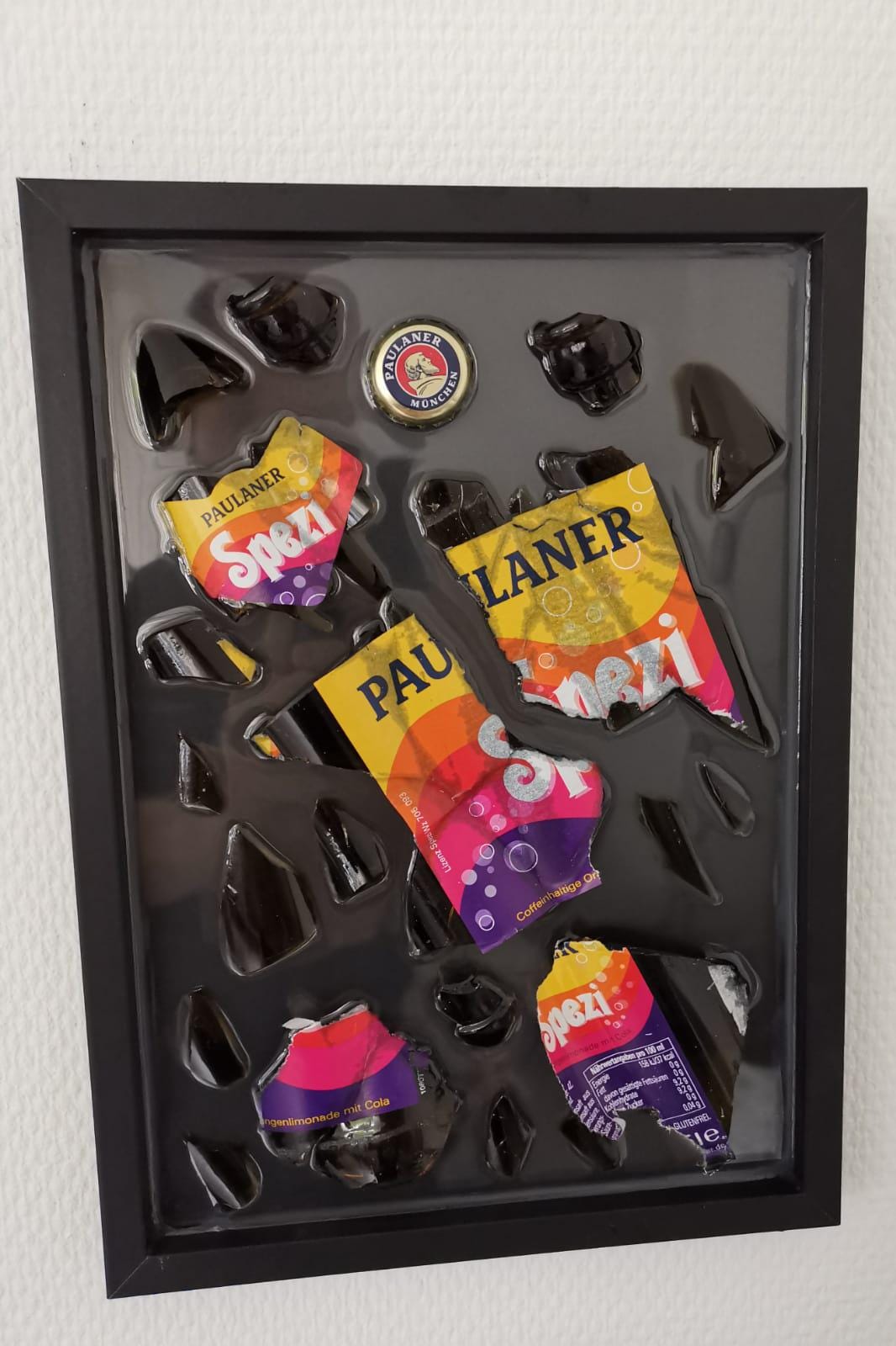 Paulaner Spezi Zerbrochene Flasche
