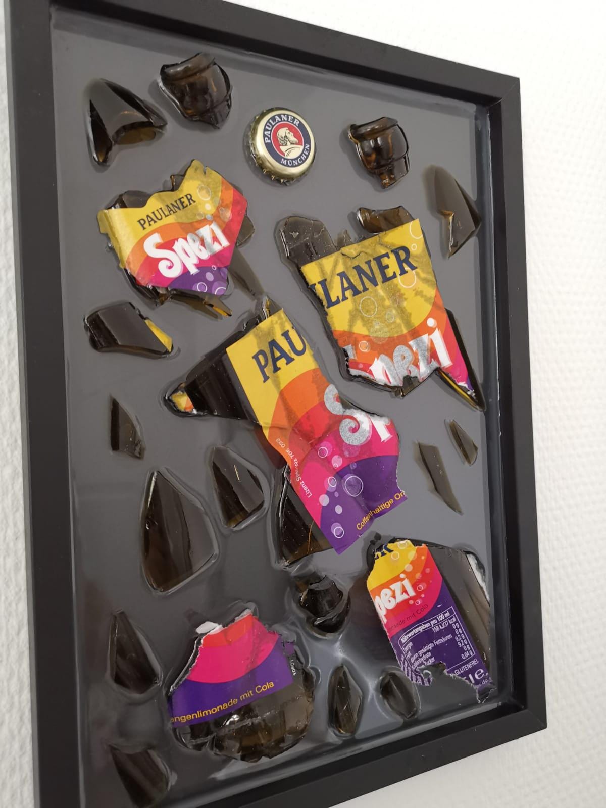 Paulaner Spezi Zerbrochene Flasche