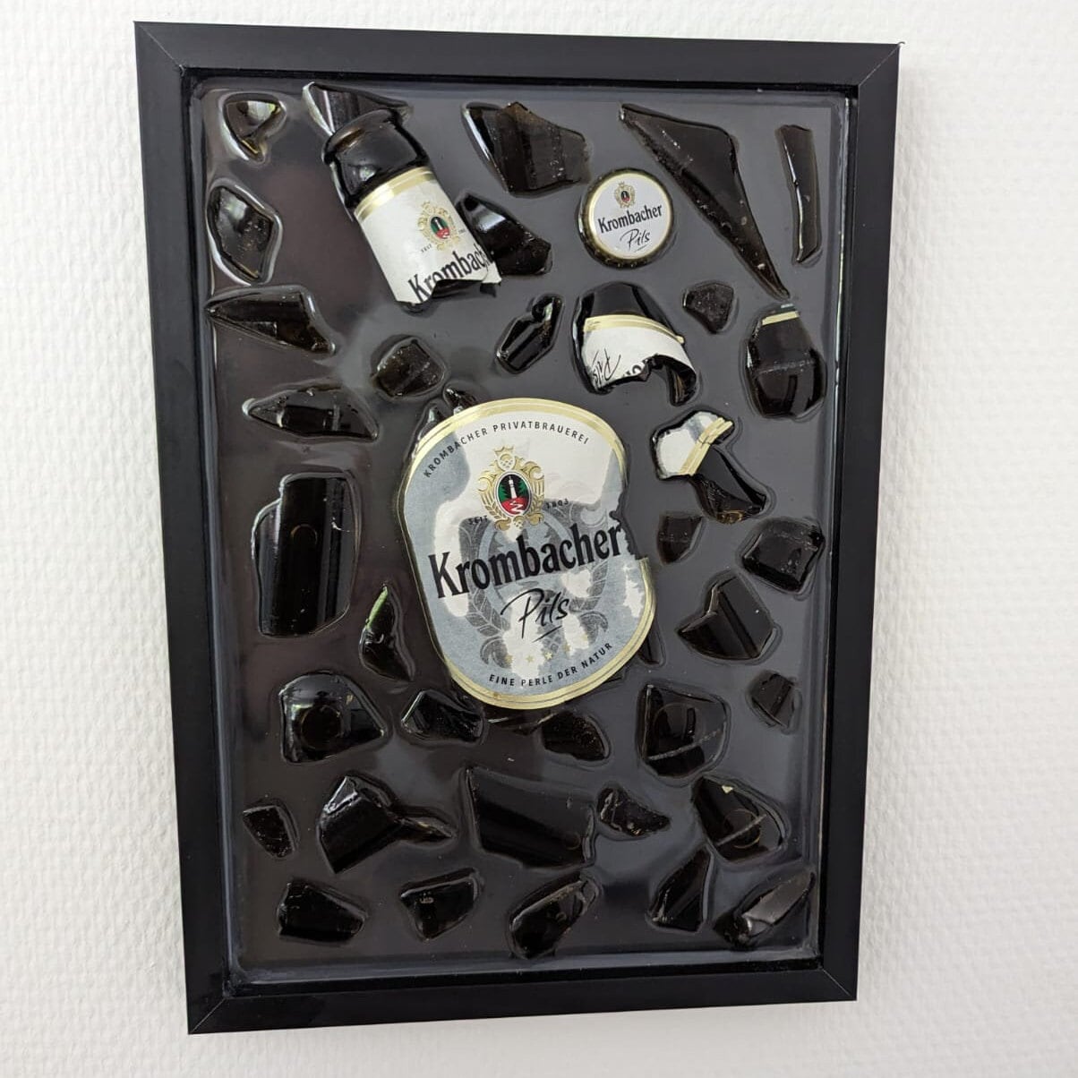 Krombacher Zerbrochene Flasche
