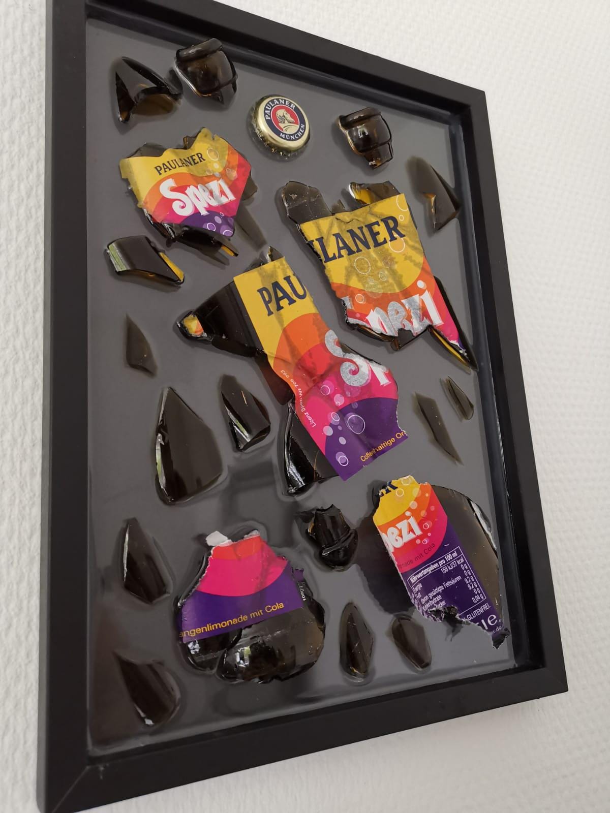 Paulaner Spezi Zerbrochene Flasche
