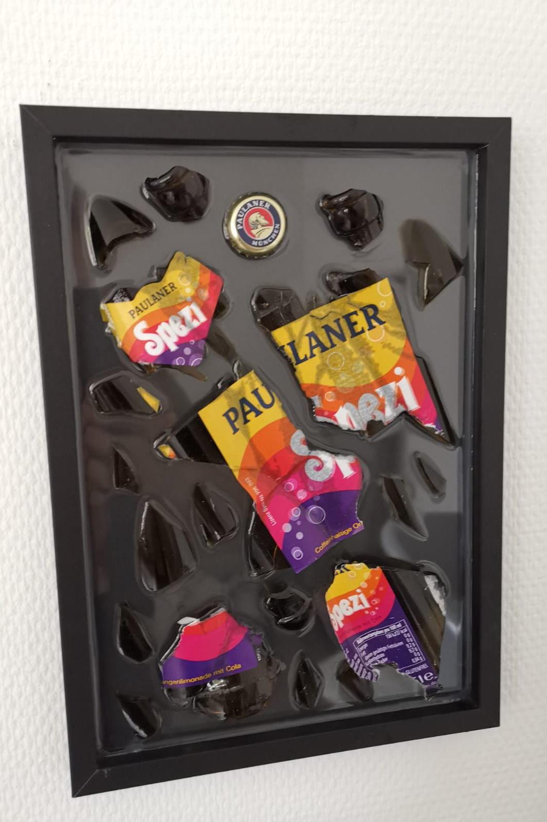 Paulaner Spezi Zerbrochene Flasche
