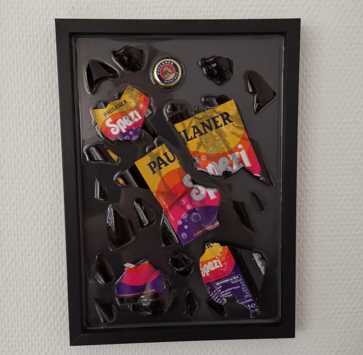 Paulaner Spezi Zerbrochene Flasche